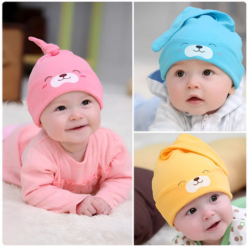 Baby soft cotton sleeping cap with cartoon bear design in blue, gold, and pink colours