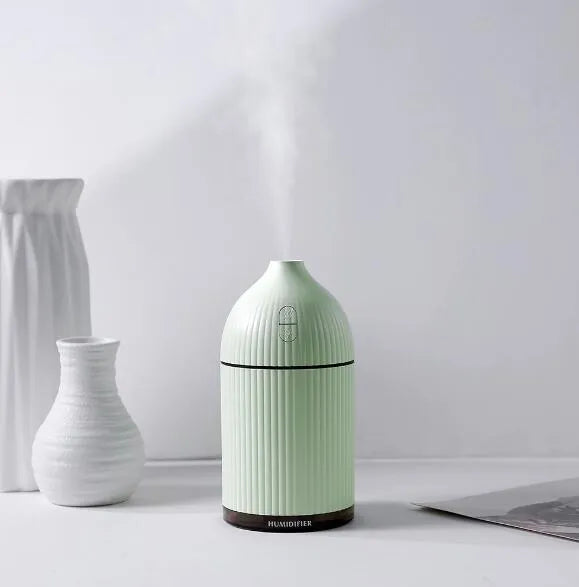 White ultrasonic aromatherapy diffuser and humidifier with LED light, 300ml capacity, 80mm diameter