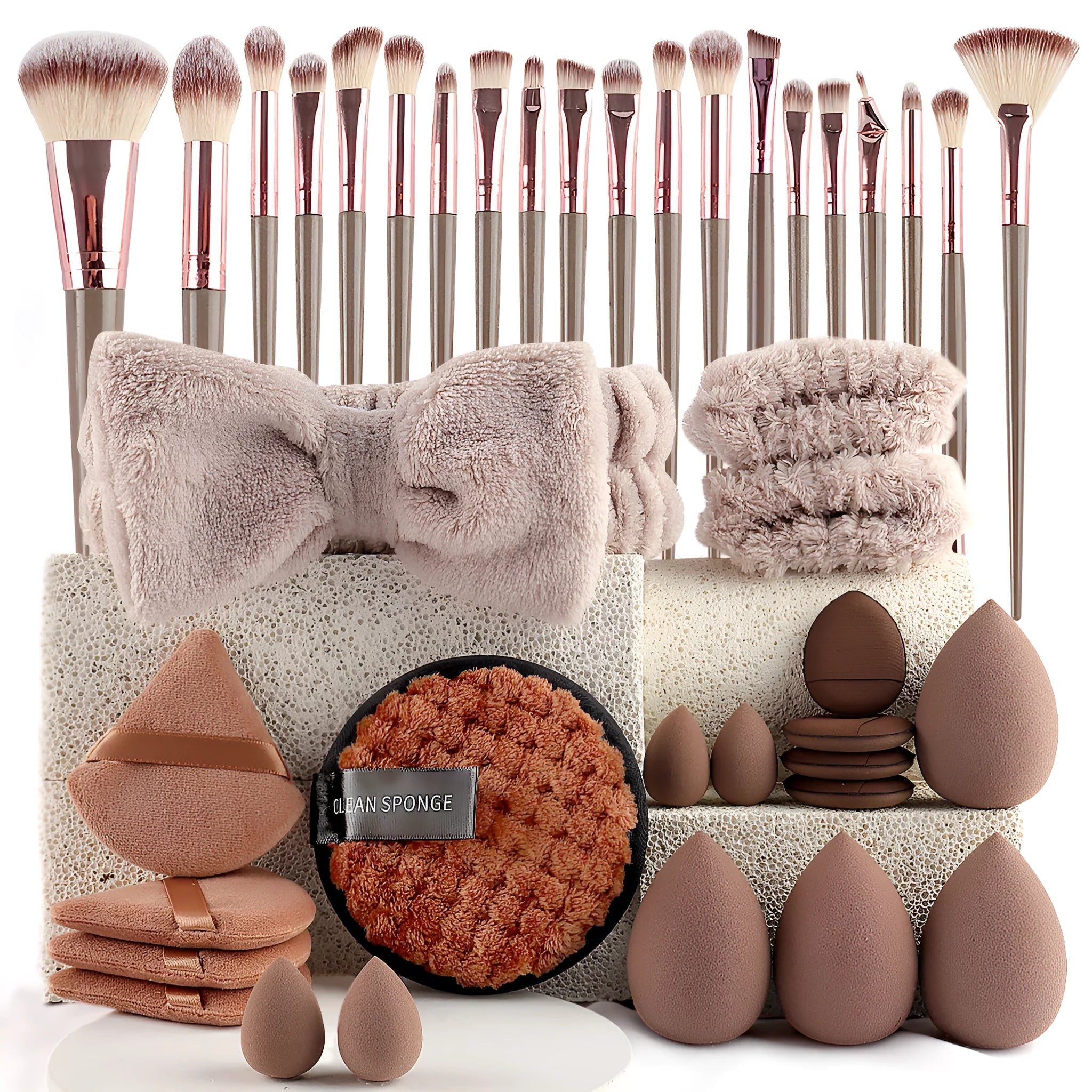 Hydrophilic non-latex beauty tool set in brown, pink and purple colours for facial cleansing and makeup application