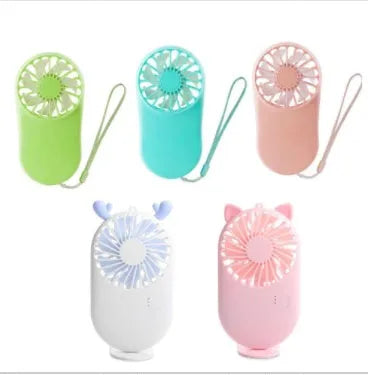 Blue portable USB rechargeable mini fan with three speed modes on a desk, plastic blade and piano switch visible