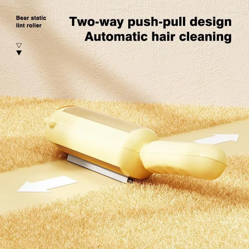 Blue reusable pet hair remover tool with a self-cleaning base on a fabric sofa.
