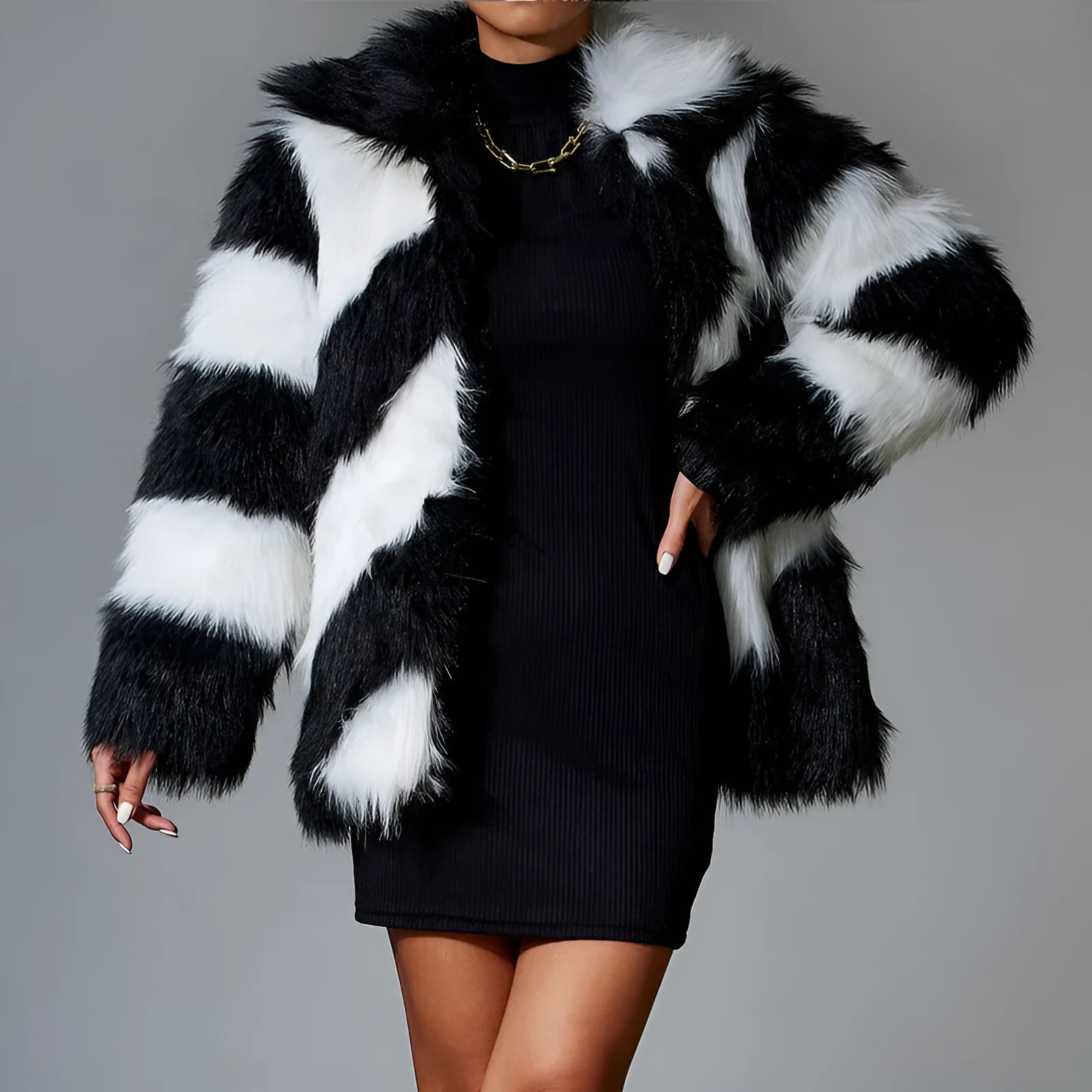 Women's faux fur coat with contrasting lapels and a full fur collar in a regular fit.