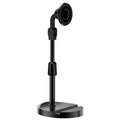 Black 360-degree rotating magnetic phone holder for car dashboard and live broadcast, universal magnetic suction mount.