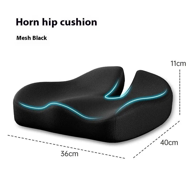 Memory foam office chair cushion with removable mesh cover in grey, shown on a desk chair.
