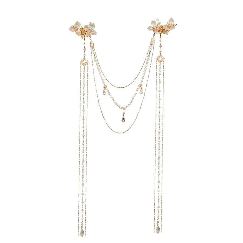 Gold grip acrylic hairpin with white pearl, clear diamond flower, and long beaded tassel decoration.