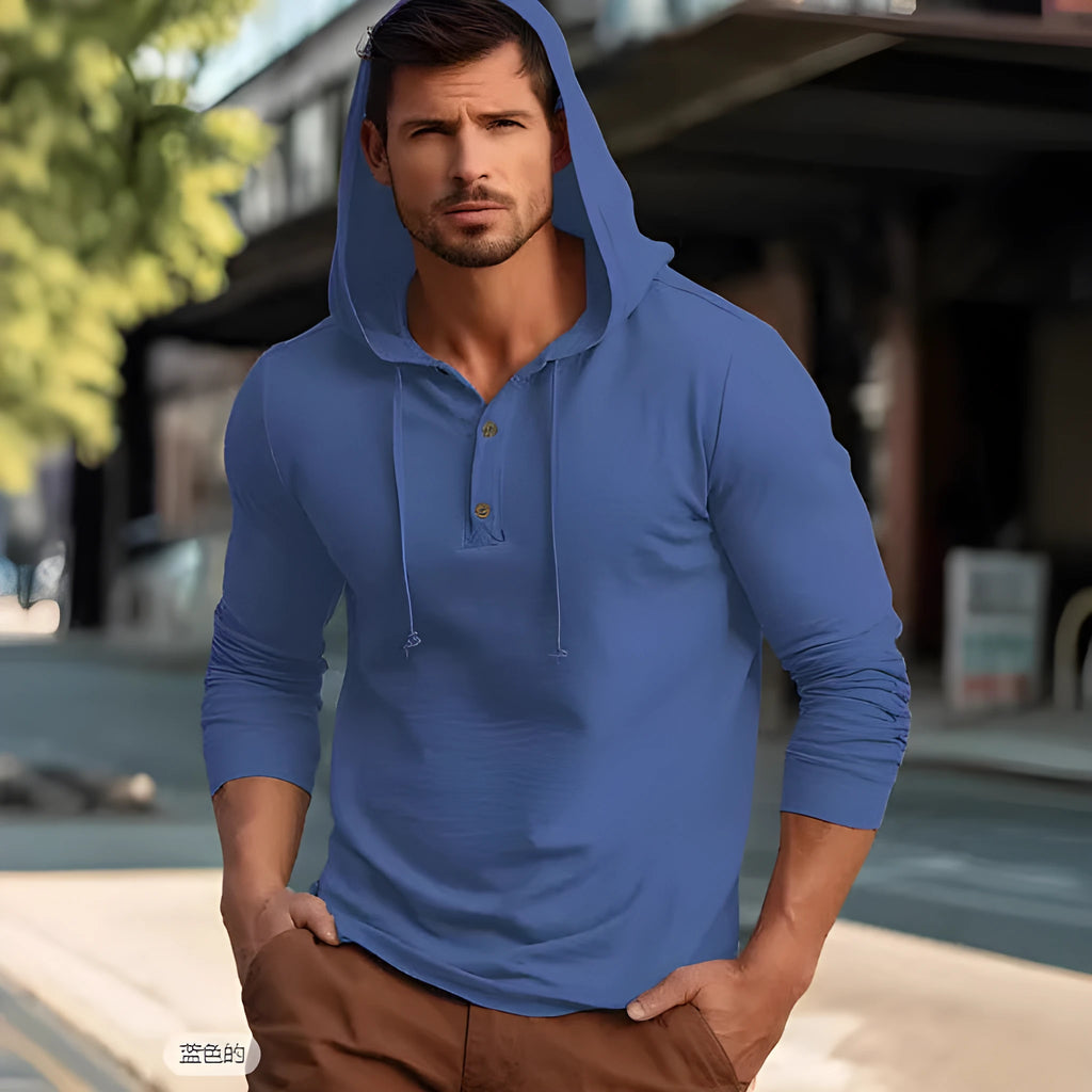 Men's dark blue cotton pullover hoodie with long sleeves laid flat.