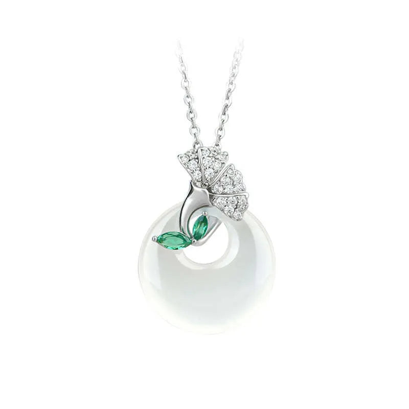 White ginkgo leaf pendant necklace with mixed gem inlay on silver electroplated O-ring chain