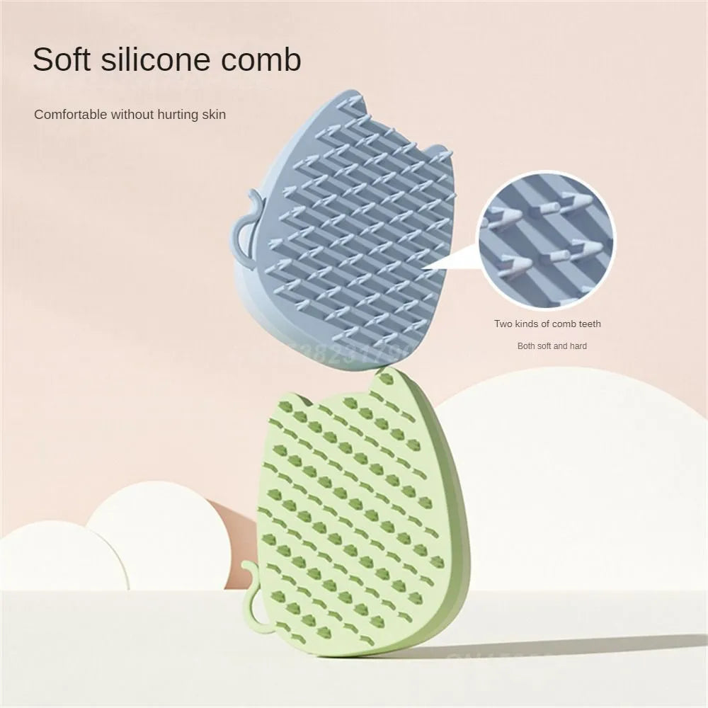 Blue silicone pet grooming brush with dual-texture bristles on a white background.