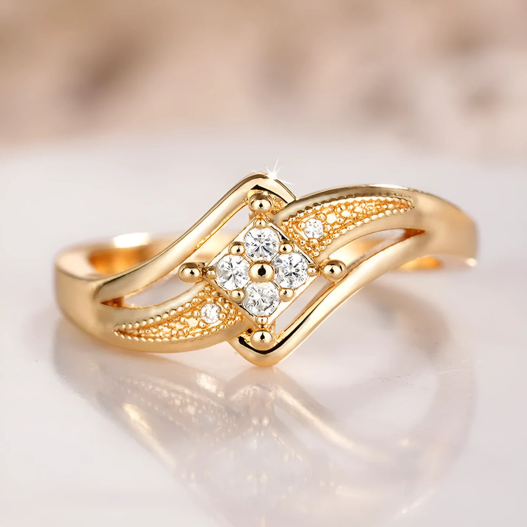 Yellow gold copper women's ring with diamond shape and micro inlaid zircon ornamentation.