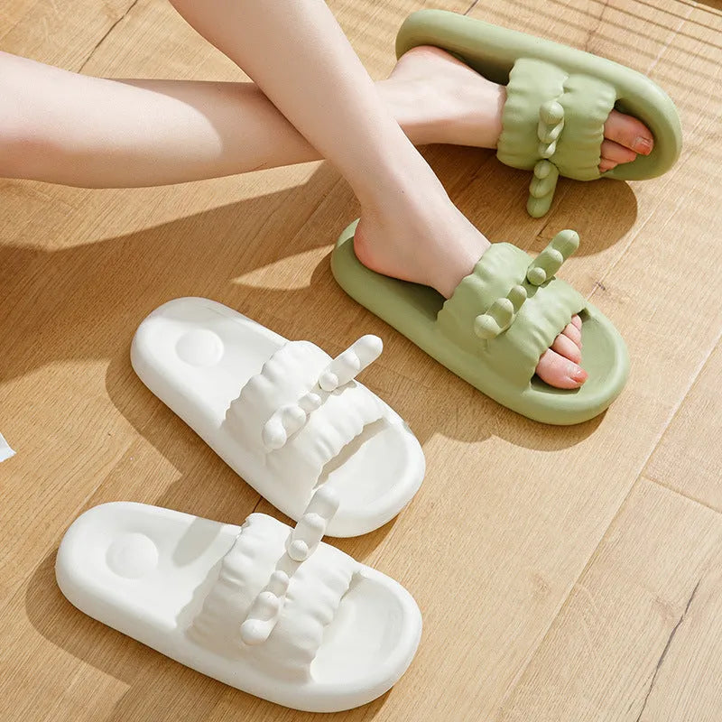 Women's deer horn pattern flip-flop slippers in light yellow with a textured EVA sole.