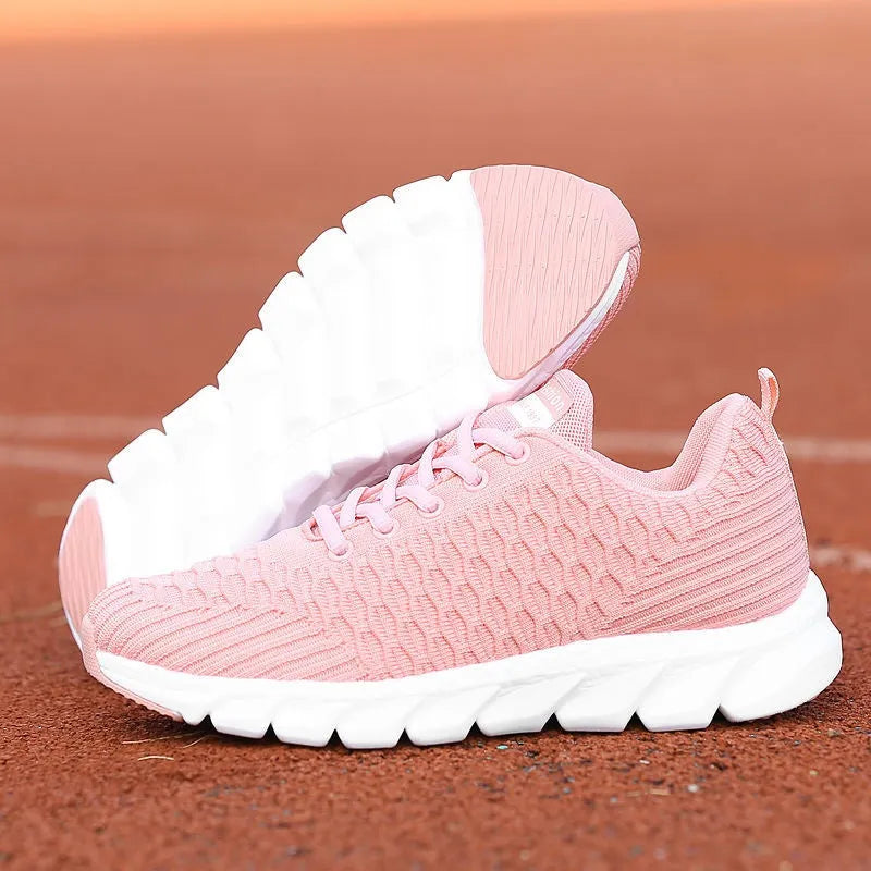 Women's running shoes with fly weaving upper in black, pink, and white colour options