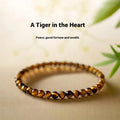 Tigereye stone bracelet with Chinese style geometric pattern in three bead sizes