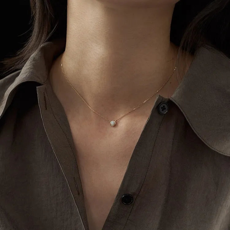 S925 sterling silver oval pendant necklace with a jelly opal stone, shown in gold and white gold plating options.