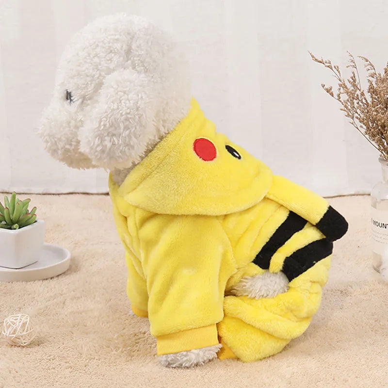 Small dog wearing a red fleece winter coat with cartoon ears, showcasing the costume design.
