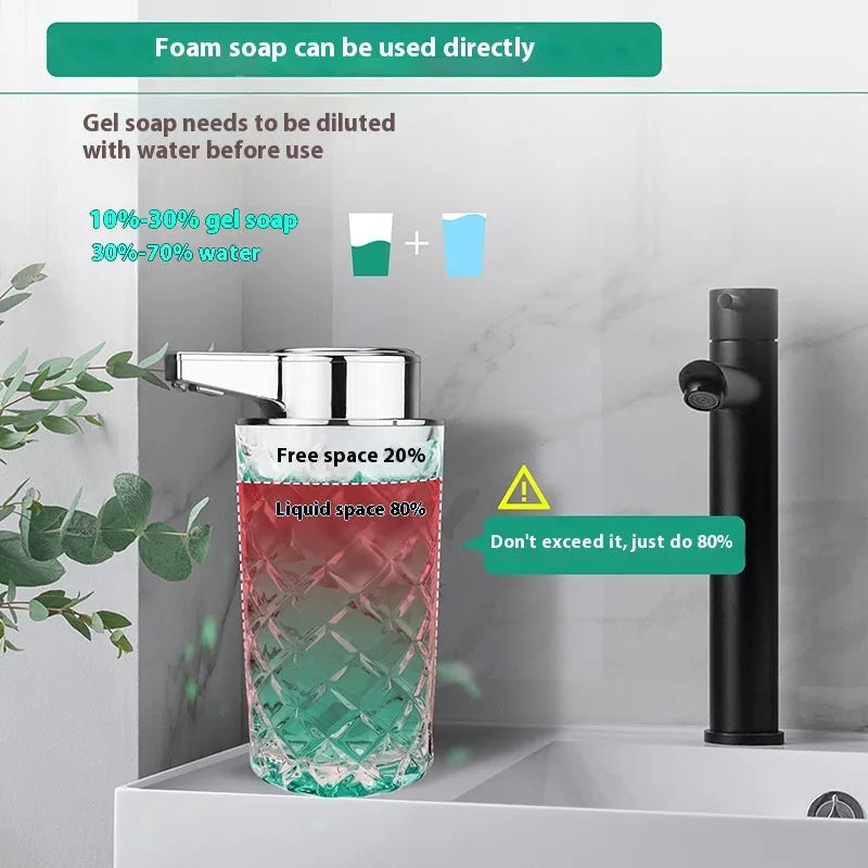 Silver automatic sensor soap dispenser with type-c charging port on a bathroom countertop.