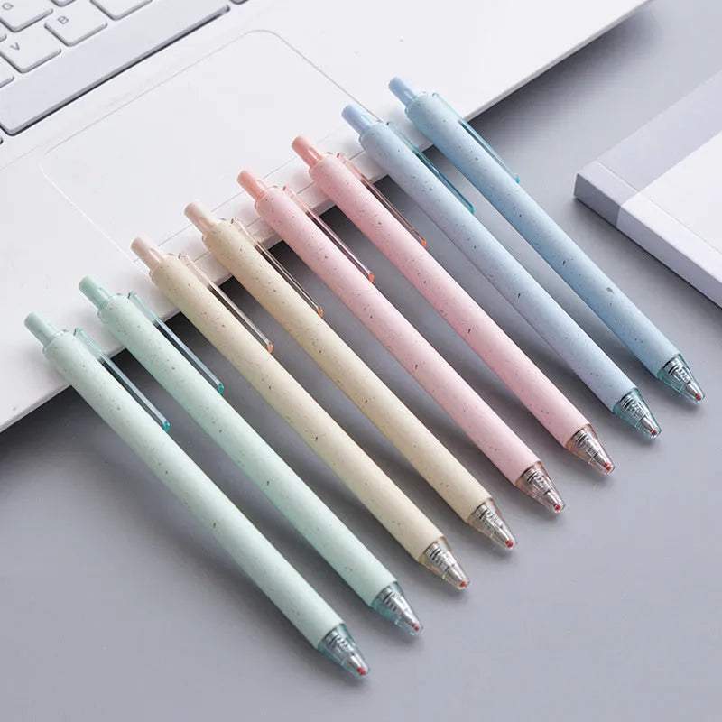 Set of 12 push-type 0.5mm gel pens in assorted colours with replaceable refills and quick-drying black ink