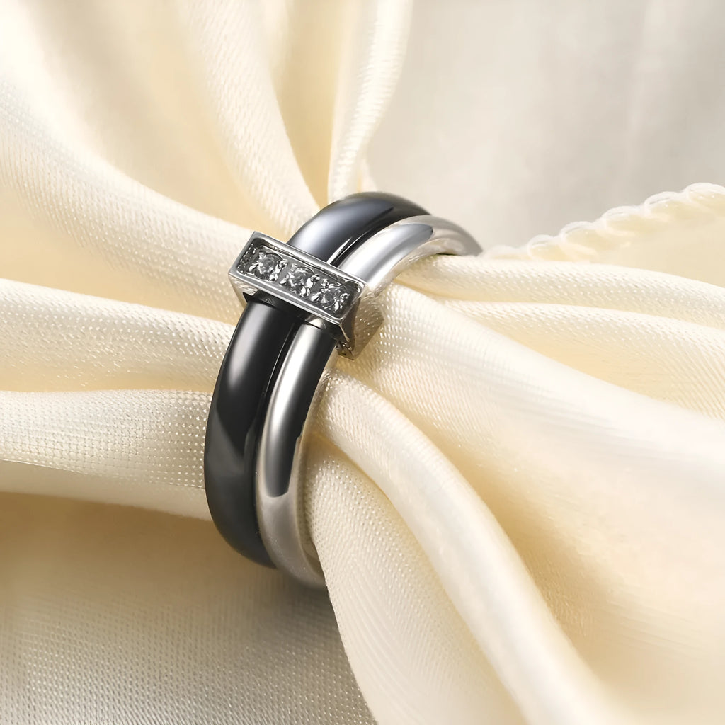 Geometric ceramic women's ring with round zirconium inlay and glossy stitching in steel black or golden white finish