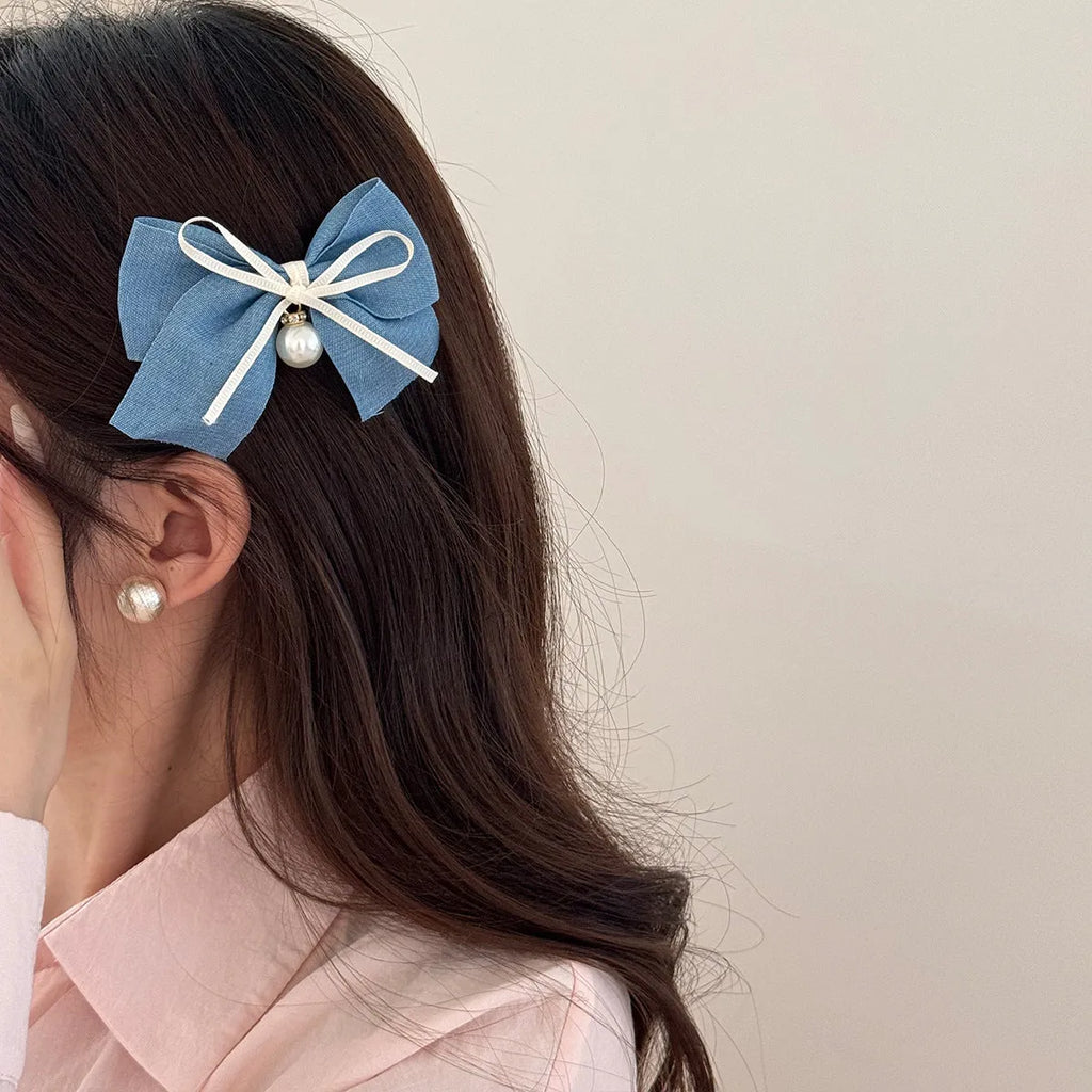 Fabric hair clips with lace, bow, and pearl butterfly designs for women