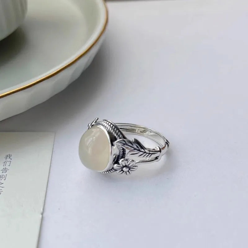 Copper vintage ring with imitation white chalcedony stone and adjustable open mouth design