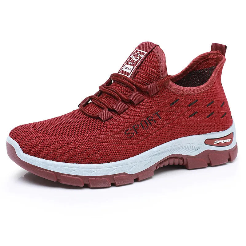 Men's and women's low-top casual sneakers with round toe and soft PVC sole in multiple colours.