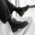 Men's black Dr Martens 8-hole high-top platform boots with a side zipper and frosted leather upper.
