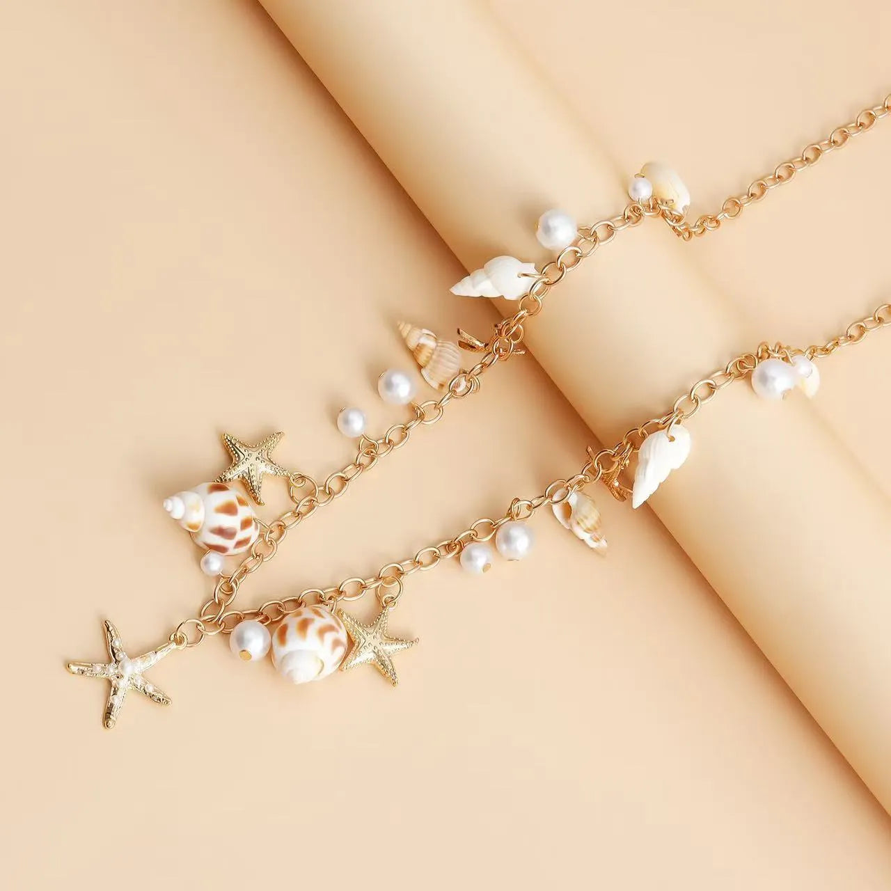 Women's alloy waist chain and matching bracelet with star shell designs for beach festival jewellery