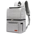 Blue double layer insulated backpack with large main compartment and adjustable straps.