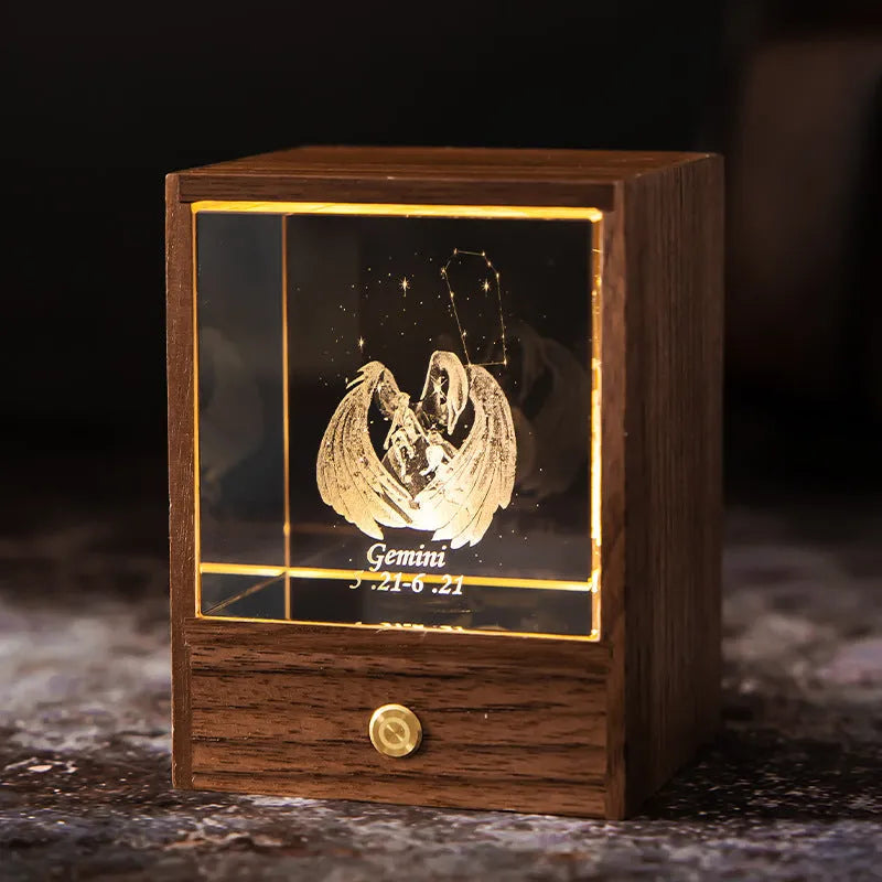 Crystal LED table lamp with black walnut base and K9 crystal showing constellation night light effect