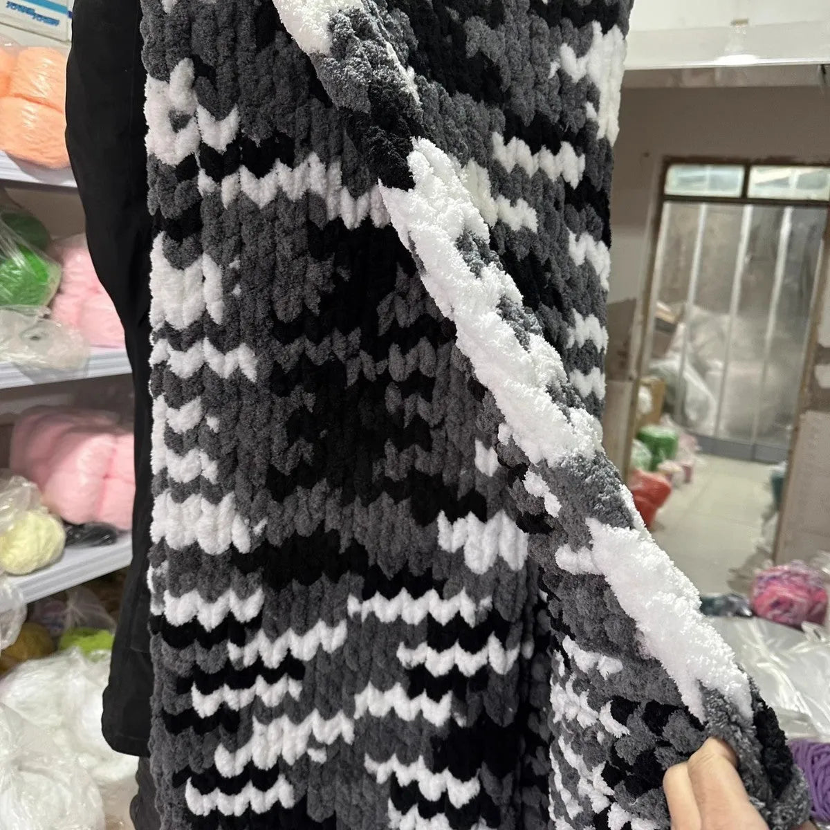 Coarse yarn chenille knitted braided gravity blanket in modern simplicity style, showing textured velvet surface.
