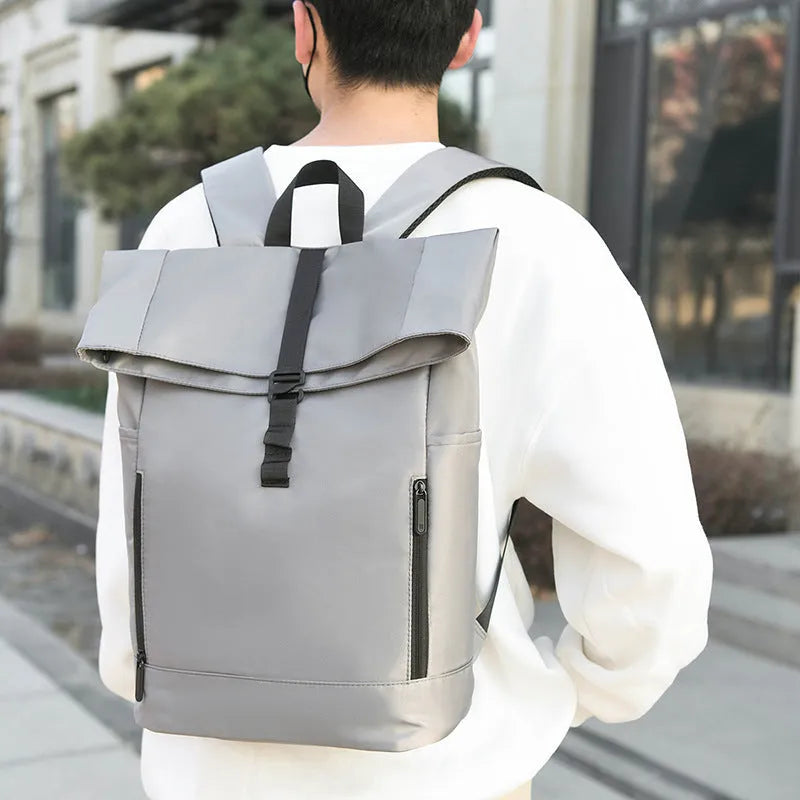 Men's nylon business leisure schoolbag in black, blue, or gray with waterproof breathable expansion and burden reduction.