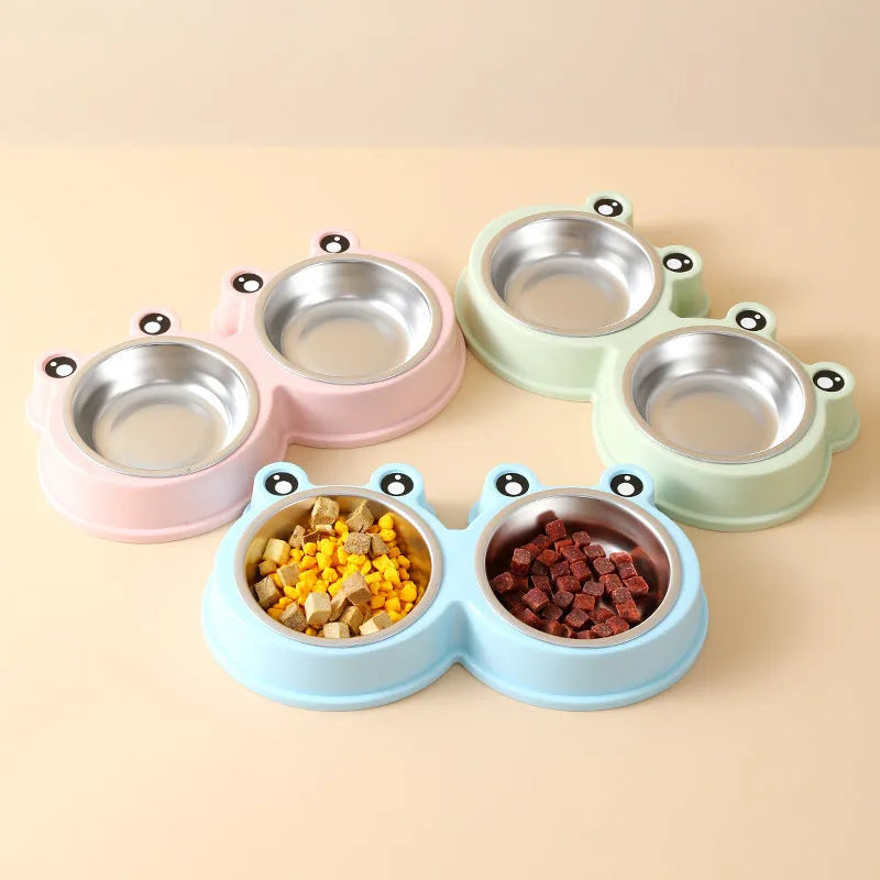 Stainless steel pet double feeding bowl with frog design in blue, green, and pink colours