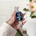 Zinc alloy Apple Watch strap with twist diamond pattern in silver, rose gold, gold, black, and Starlight colours.