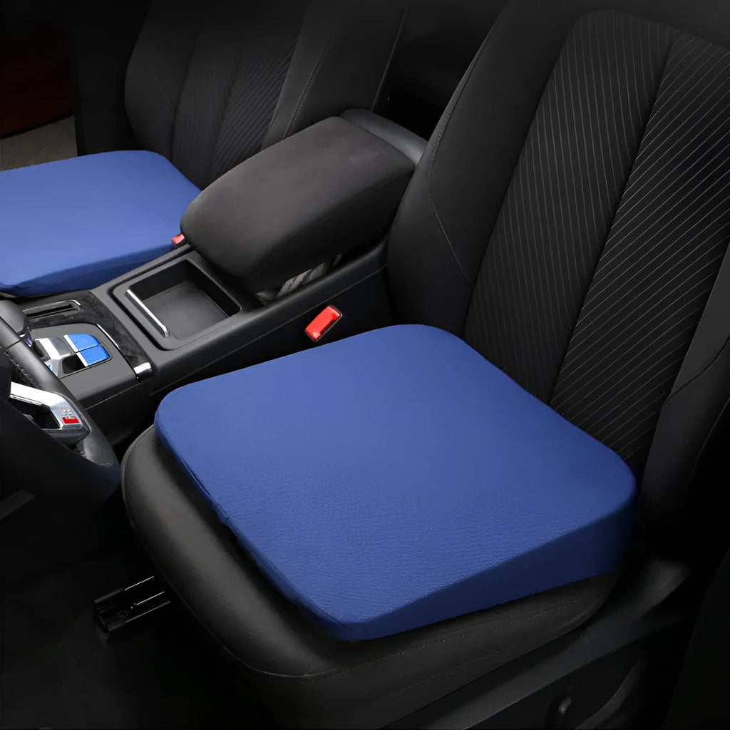 Black car seat cushion for height adjustment measuring approximately 42x39x6cm