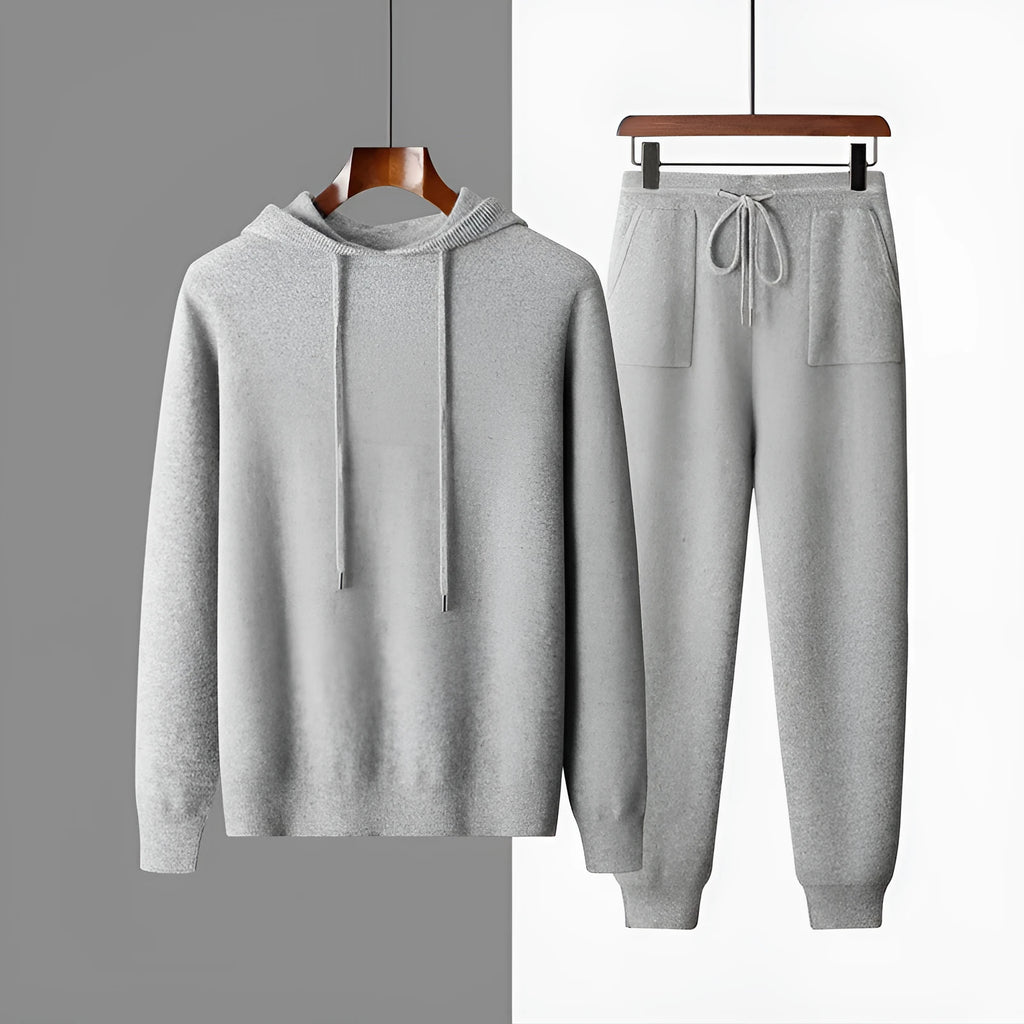 Men's light gray cashmere hooded sweatshirt and long pants set on a hanger.