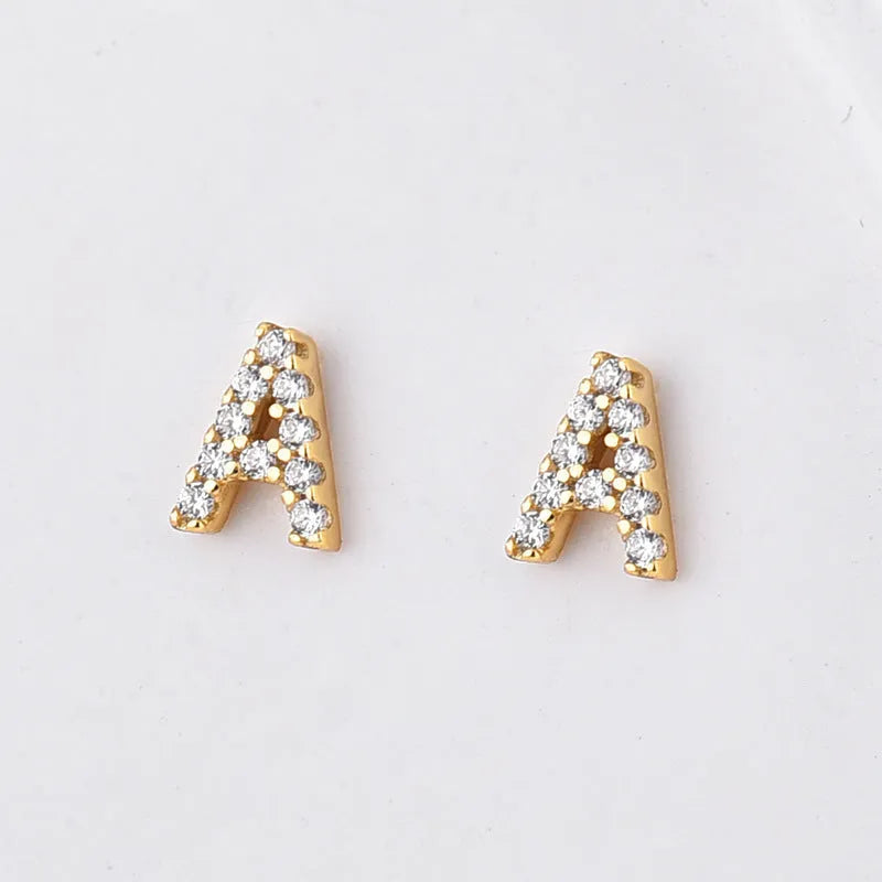 Brass gold plated alphabet letter earrings showing A to Z initial options with diamond treatment on zircon elements