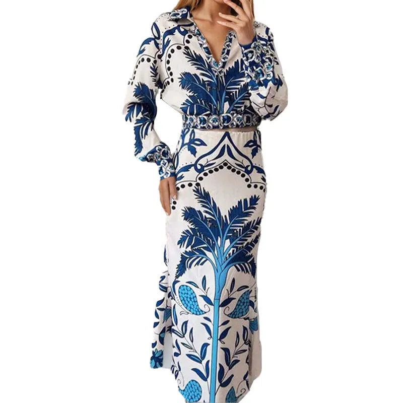 Women's floral print casual co-ord set with long sleeve top and long skirt on a hanger.