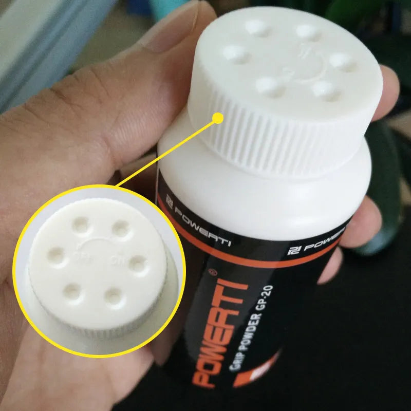 White magnesium carbonate sports anti-slip powder in container for badminton and weightlifting.