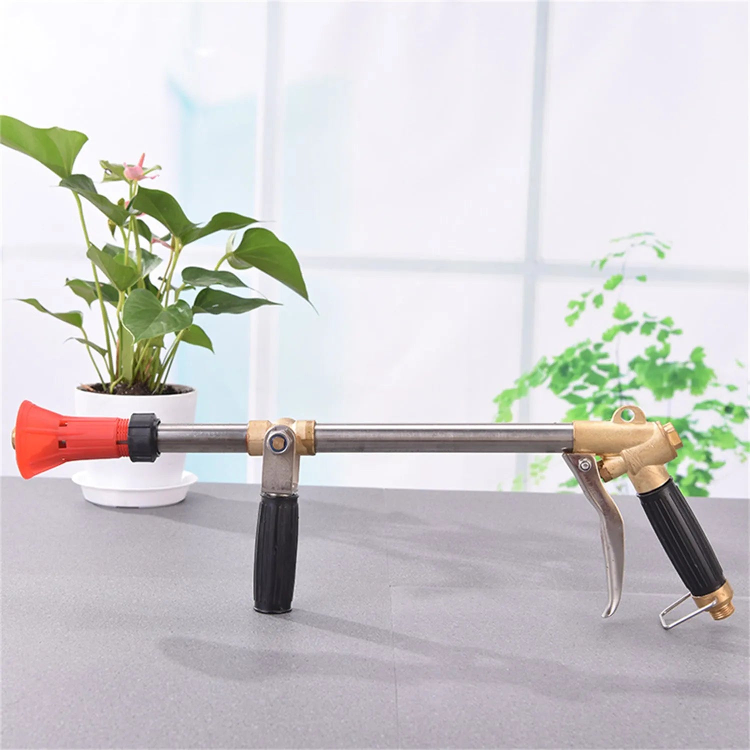 Submachine gun style agricultural spray gun for pesticide spraying with plastic construction
