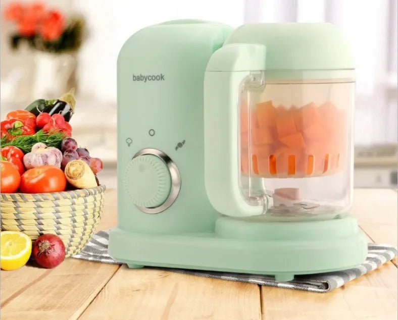 Baby food processor steamer blender in green or pink with double mixing blade
