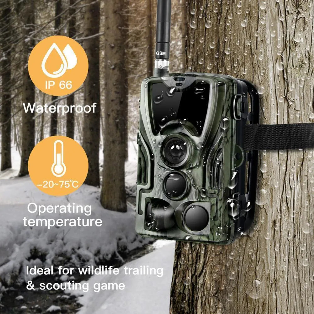 Green cellular trail camera with display screen and infrared sensors for outdoor wildlife monitoring