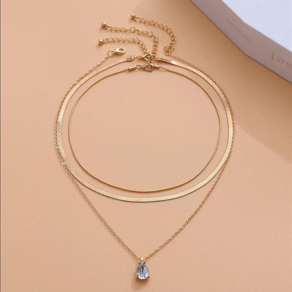 Sweet Cool Simple Metal Niche Water Drop Necklace in gold finish on display