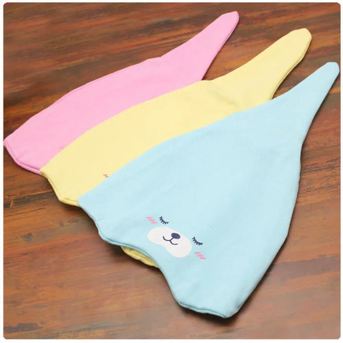 Baby soft cotton sleeping cap with cartoon bear design in blue, gold, and pink colours