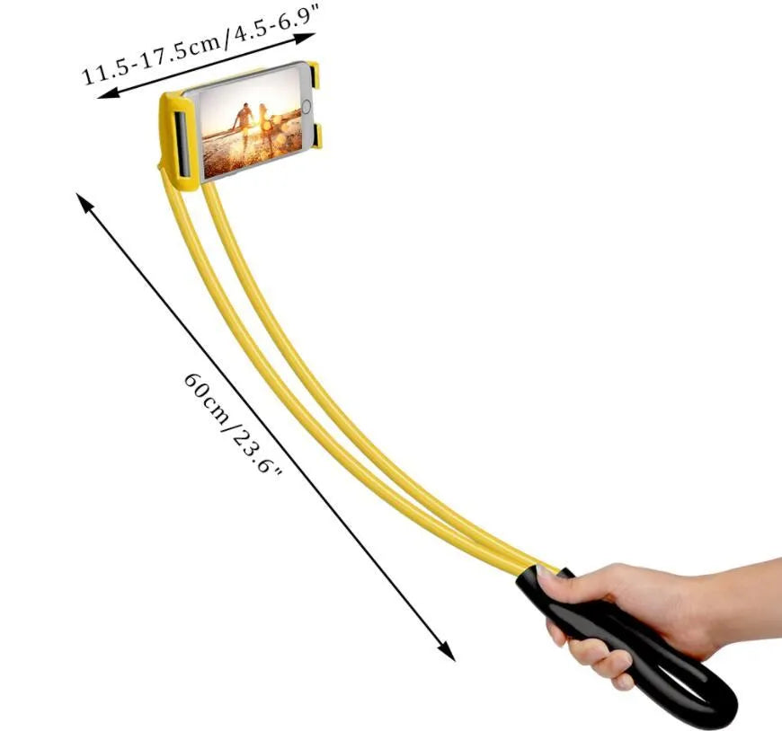 White plastic and foam 360-degree rotatable universal phone holder on a table.