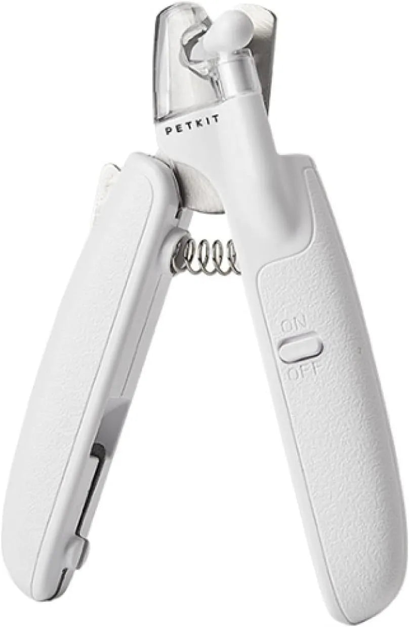 White pet nail clippers with LED light, transparent guard, triangular blades, and anti-slip handles for cat and dog grooming