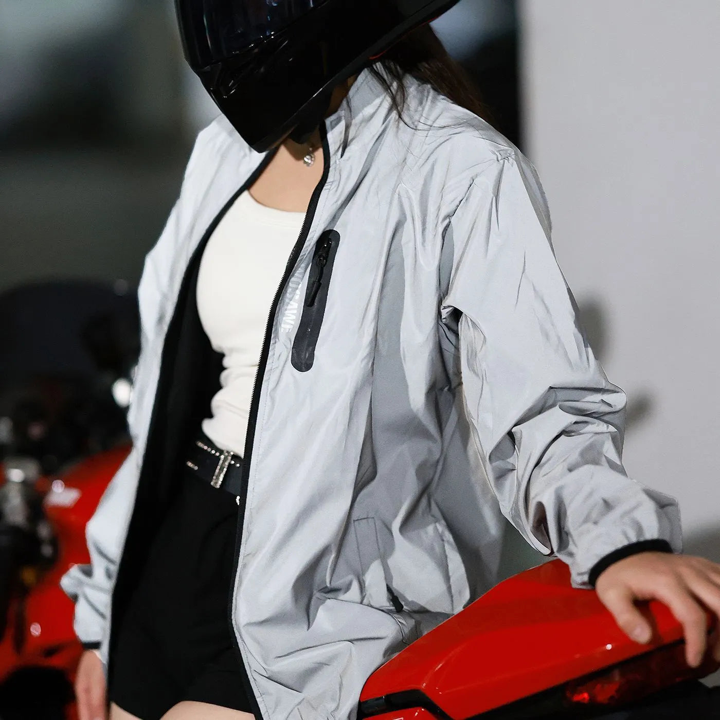 Waterproof polyester long sleeve top in silver BL220 colour showing windproof waterproof features