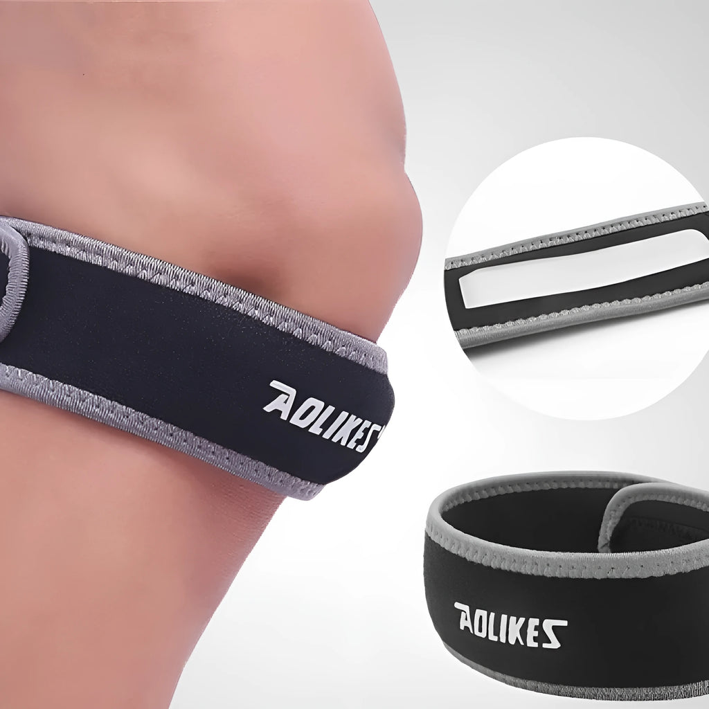 Black and grey patella retinaculum knee support strap for adult sports use.