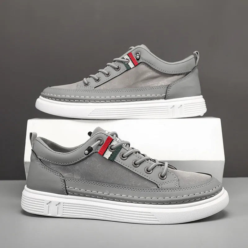 Men's black high-top canvas sneakers with a round toe and PU upper on a white background