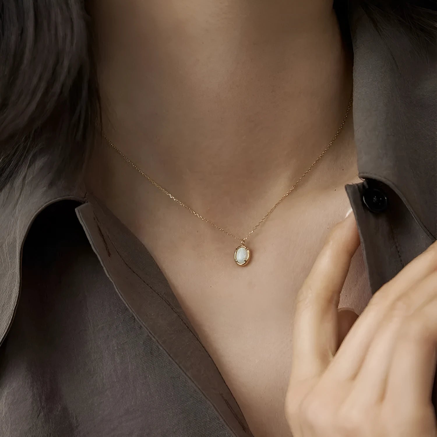 S925 sterling silver oval pendant necklace with a jelly opal stone, shown in gold and white gold plating options.