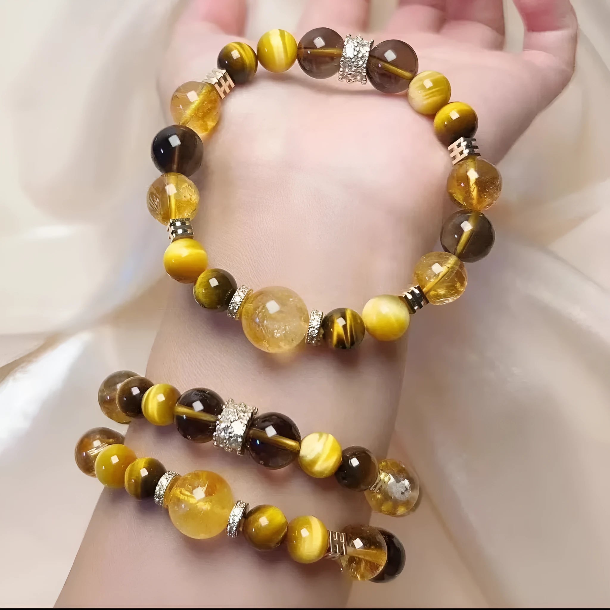 Natural yellow artificial crystal bead bracelet with 10mm tower beads on a string.