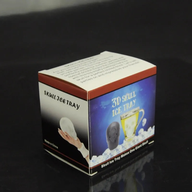 White silicone ice cube tray with detailed 3D skull mould cavities.